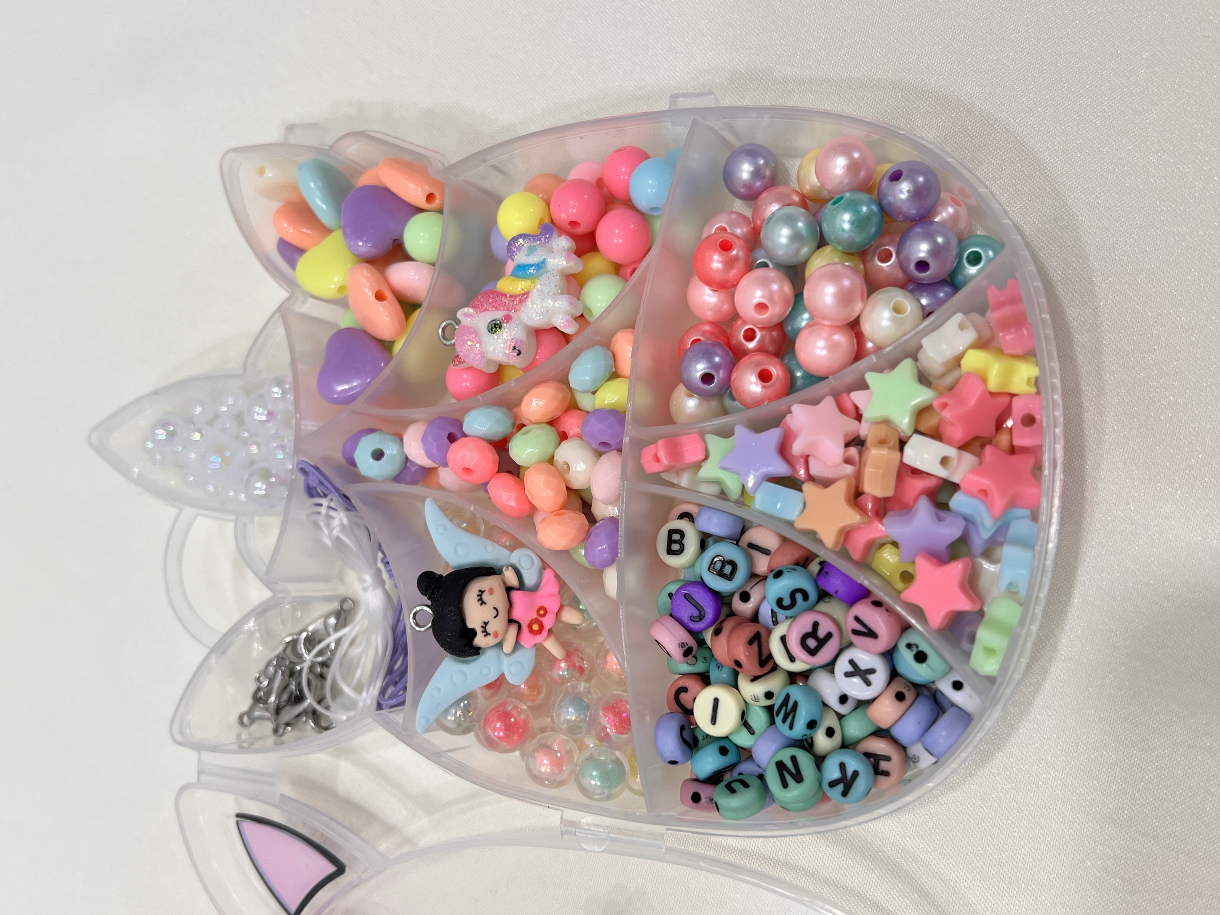 جعبه اکسسوری ساز کودکان‌ شامل :اویز فرشته و اسب تک شاخ کلی‌ مروارید و پاستلی‌ 🌈➕🧰➕🦄